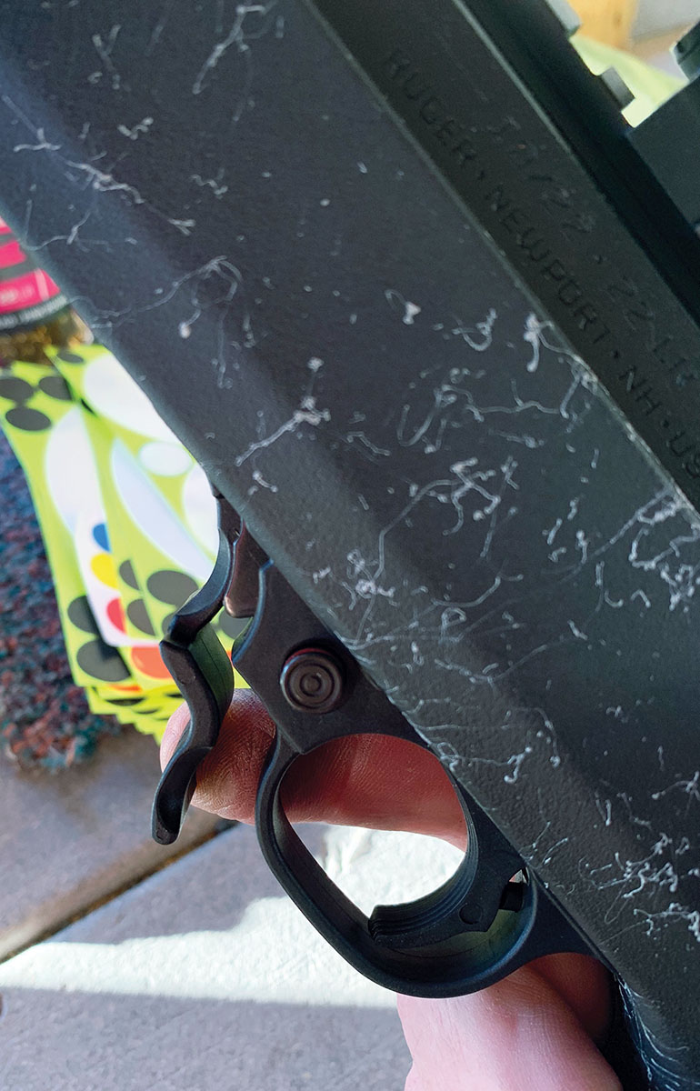 The carbon fiber 10-22 has an extended magazine release for faster and easier reloads.